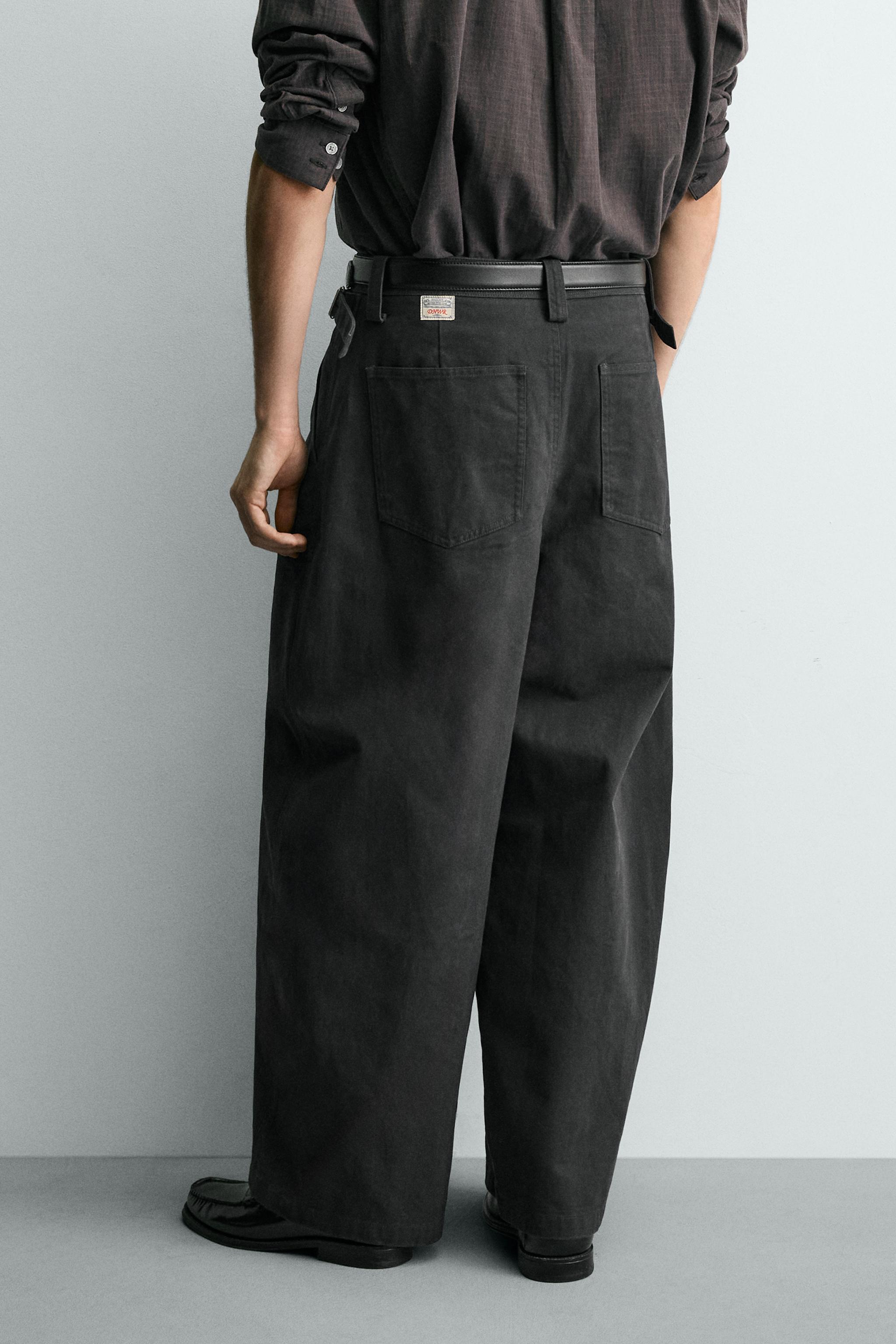 RELAXED FIT PANTS WITH TWISTED SEAM